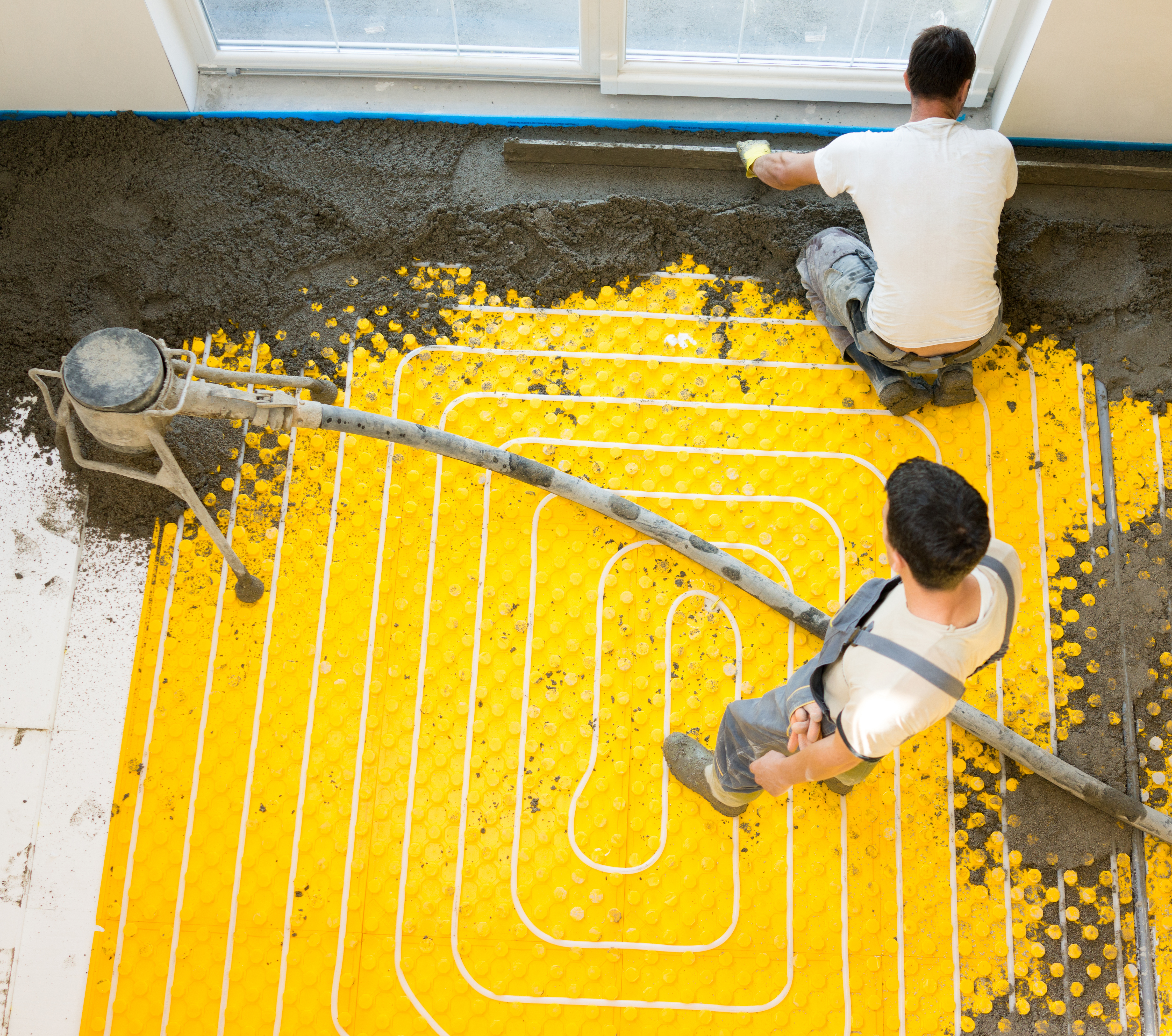 Installing underfloor heating and colling pipes modern system-1